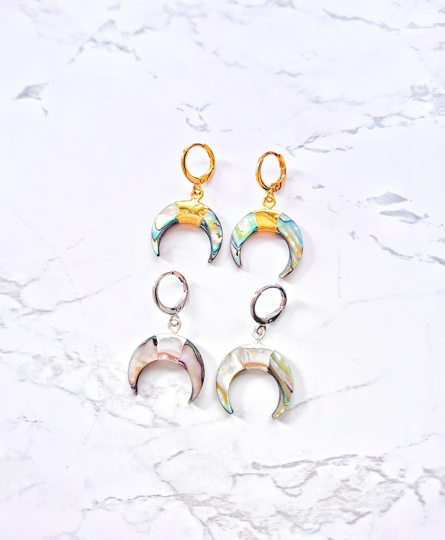 RABA gold earrings