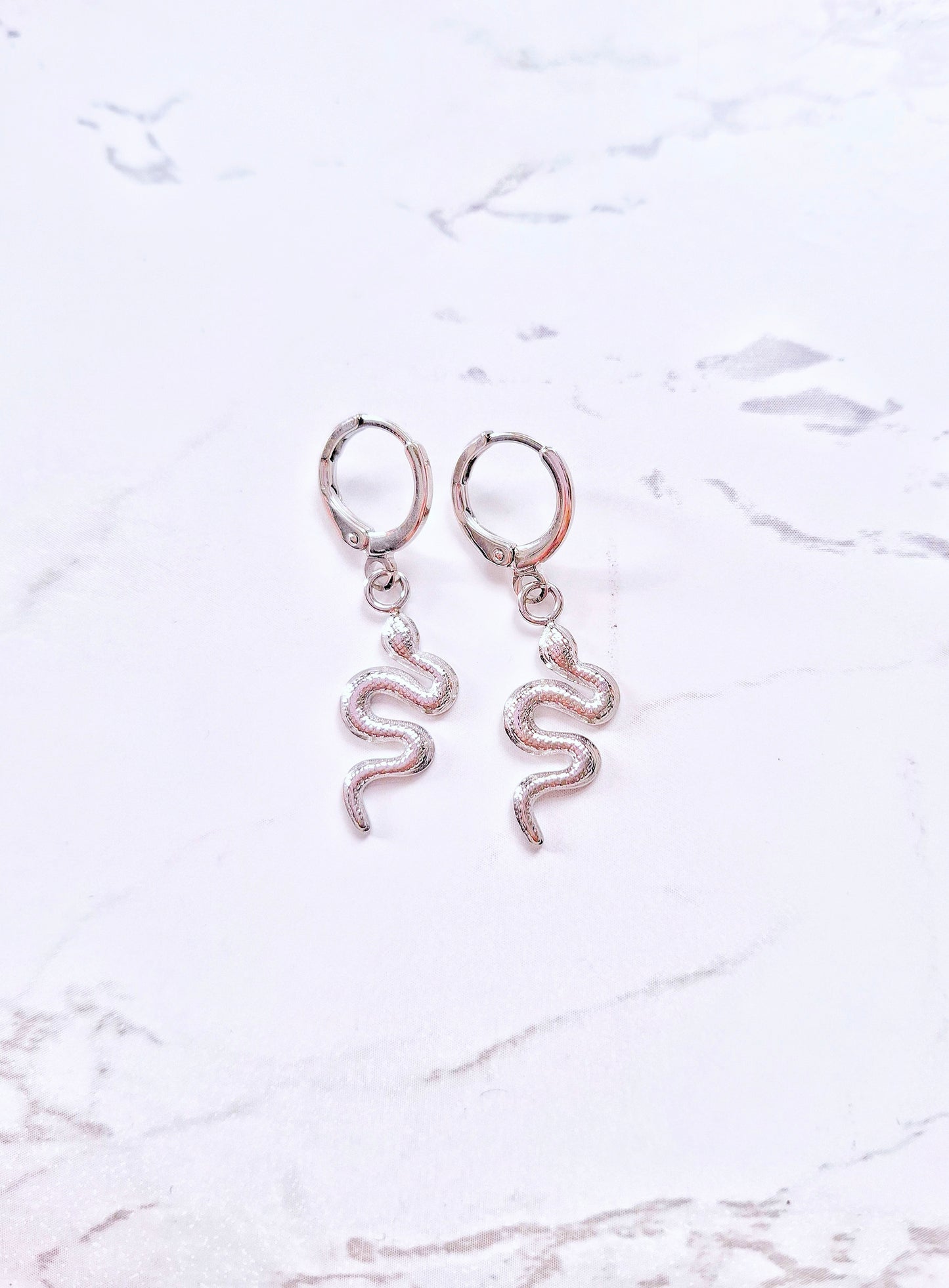 Snake earrings gold