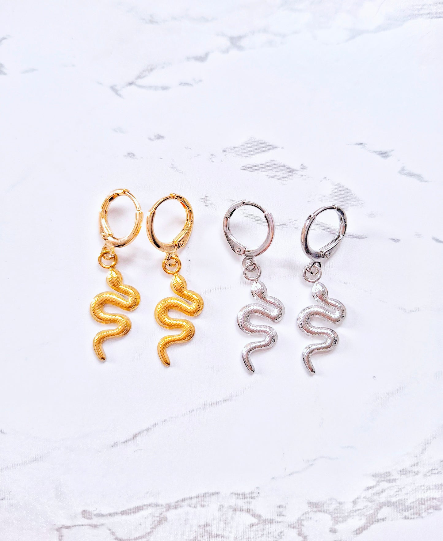 Snake earrings gold
