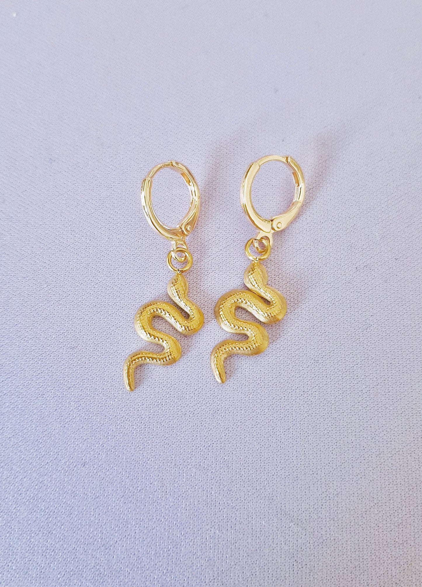 Snake earrings gold