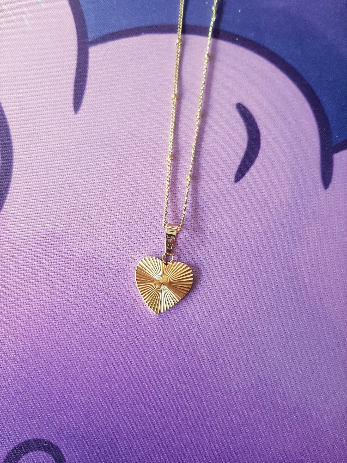 Amor gold necklace