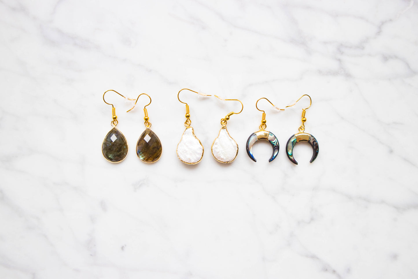 RABA gold earrings